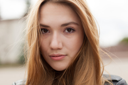 young woman on the streetの写真素材