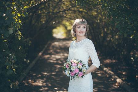 Portrait of a beautiful brunette brideの写真素材
