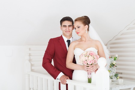 Wife and husband newly married standing togetherの写真素材