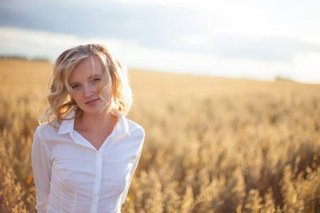 Woman in Wheat Fieldの写真素材