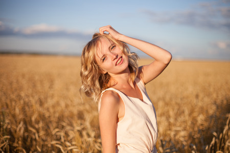 Young woman enjoying sunlightの写真素材