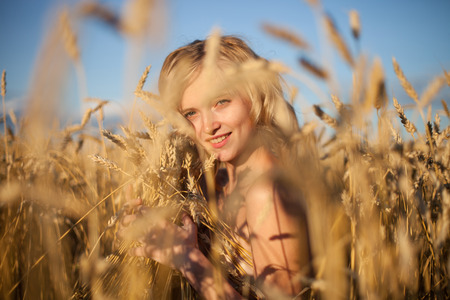 Beautyful woman in summer fieldの写真素材