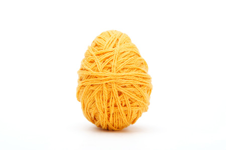 Colorful decorated easter eggs from wool yarn. Happy Easter.の写真素材