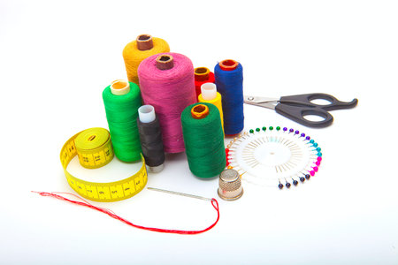 Color threads located as a rainbow isolated on white background