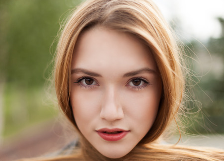 Portrait of sweet young womanの写真素材