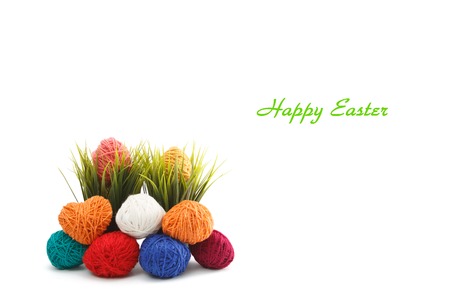 Colorful decorated easter eggs from wool yarn. Happy Easter.の写真素材