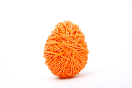 Colorful decorated easter eggs from wool yarn. Happy Easter.の写真素材