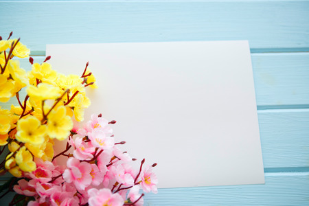 Spring Blossom flowers over clear wood background.の写真素材