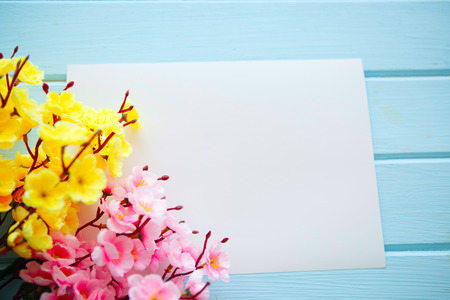 Spring Blossom flowers over clear wood background.の写真素材