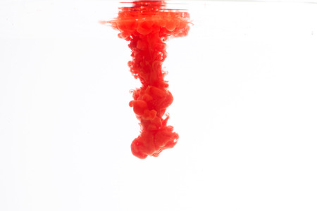 abstract pattern background with red ink in waterの写真素材