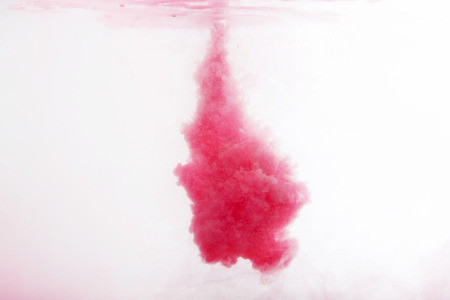 abstract pattern background with red ink in waterの写真素材