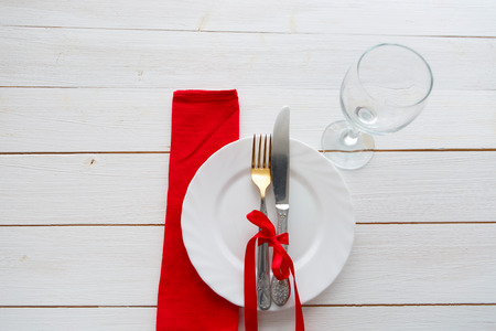 Knife and fork over wooden table with copy space. Diet Food concept.の写真素材