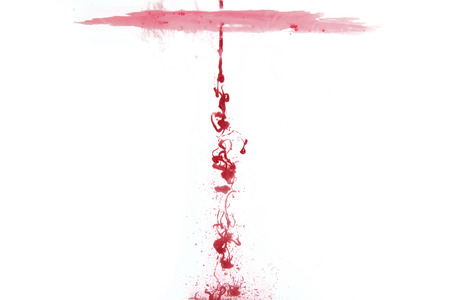 abstract pattern background with red ink in waterの写真素材