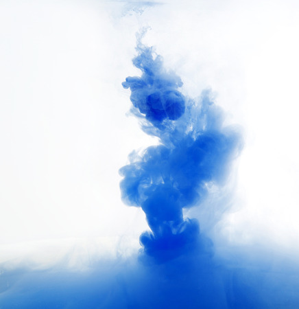 abstract pattern background with blue ink in waterの写真素材