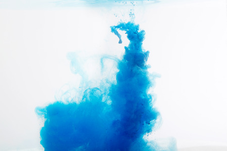 abstract pattern background with blue ink in waterの写真素材