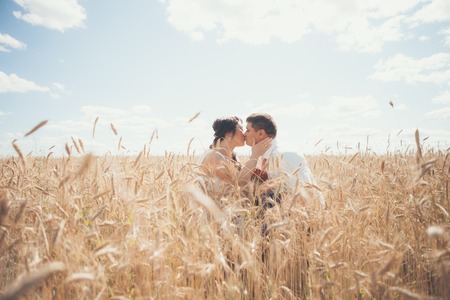Newlyweds on Wedding Day. Bride and Groom kissing.の写真素材