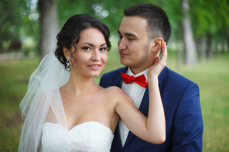 Lovely bridal couple in the forestの写真素材