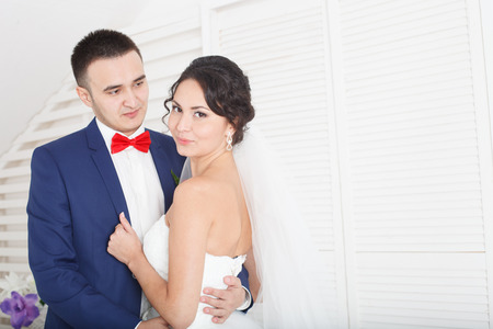 Beautiful young couple in weddingの写真素材