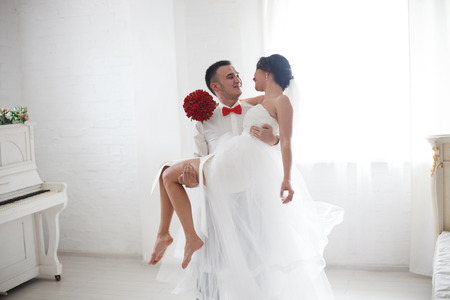 bride carried by a groomの写真素材