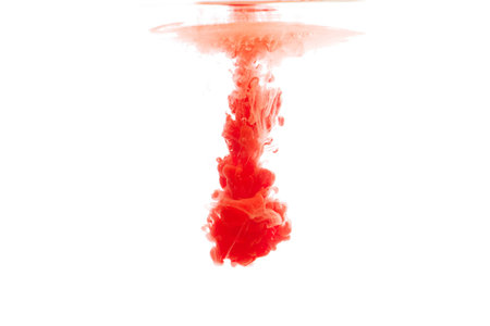 abstract pattern background with red ink in water