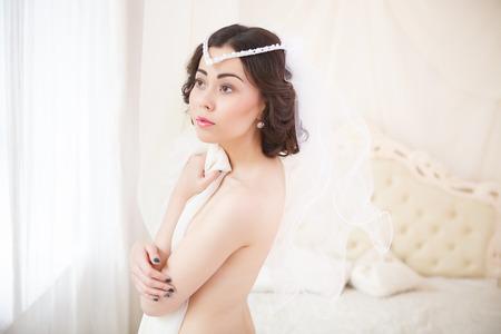 Bride getting ready on her wedding dayの写真素材