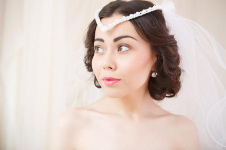 Bride getting ready on her wedding dayの写真素材