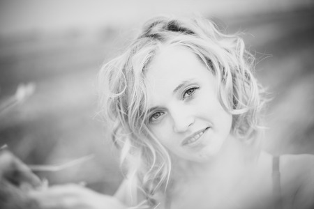Blonde Beauty in Wheat Fieldの写真素材
