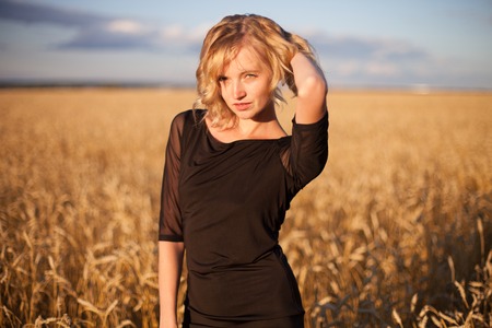 woman in a cornfieldの写真素材