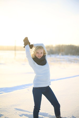 Young woman enjoying winterの写真素材