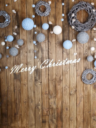the brown wood texture with white snow and stars. Christmas backgroundの写真素材