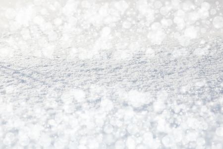 Abstract silver background or glitter blue background. Christmas background with white snowflakesの写真素材