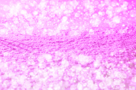 Abstract pink background or glitter blue background. Christmas background with white snowflakesの写真素材