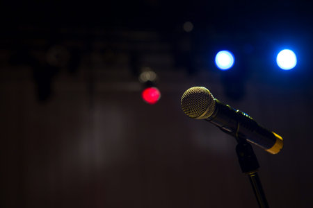 Close up of microphone in concert hall or conference room