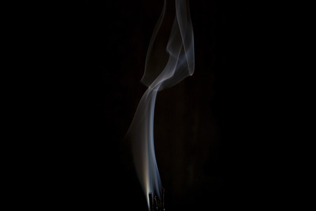 White smoke on isolated dark or black backgroundの写真素材
