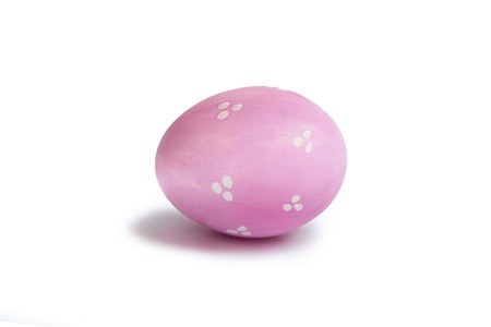 Pink easter egg isolated on a white background.の写真素材