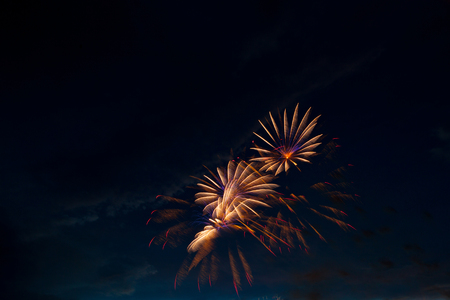 Beautiful colorful fireworks on sky. International Fireworks. Fireworks display on dark sky background. Independence Day, 4th of July, Fourth of July or New Year.の写真素材