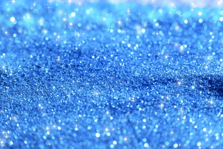 Abstract bokeh background. Christmas Glittering background. Abstract christmas background. Glittering Christmas background. Blue christmas background, Glitter christmas background.の写真素材