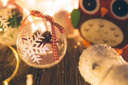 Christmas decoration on abstract background. Christmas decoration on wooden table with christmas lights. Christmas background.の写真素材