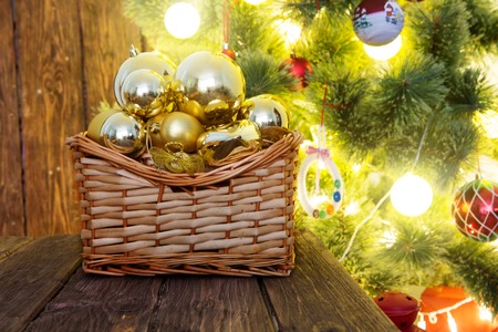 Various Christmas treats and decorations on christmas lights background.の写真素材