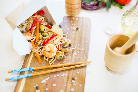 Chinese food . Noodles with shrimp, vegetables and sesame with soy sauce.の写真素材