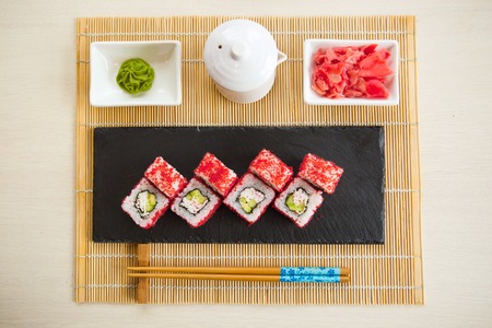Maki Sushi With Sea Fish and Cream Cheese on Table.の写真素材