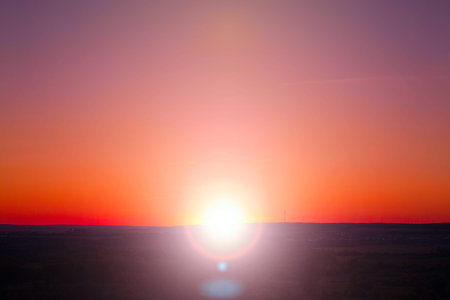 Landscape and dramatic sunset or sunrise sky. Summer or spring meadow nature.の写真素材