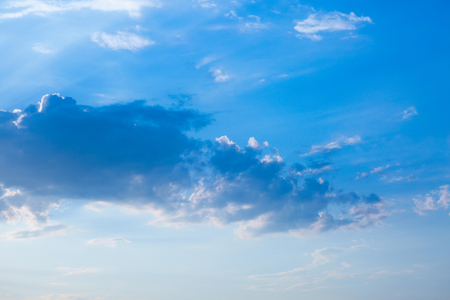 Large heavy clouds slowly float across the blue beautiful sky. Stunning landscape and view. Beautiful sky.の写真素材