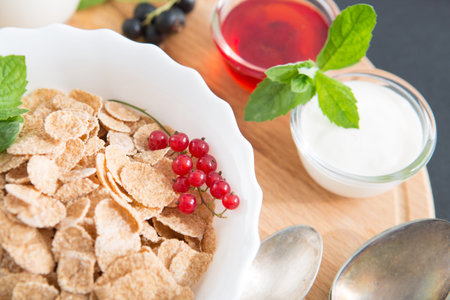 Healthy tasty breakfast multigrain wholewheat healthy cereals with strawberries, raspberries, black...