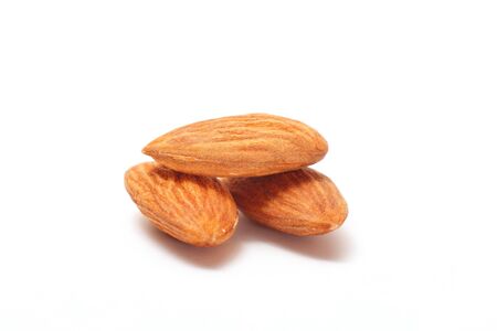 Processed almonds isolated on white backgroundの写真素材