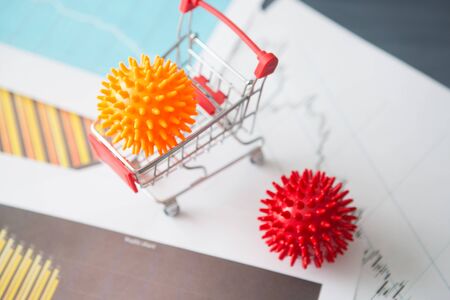 Impact of coronavirus COVID-19 on the global economy, Coronavirus in a shopping trolley. Financial crisis 2020.の写真素材