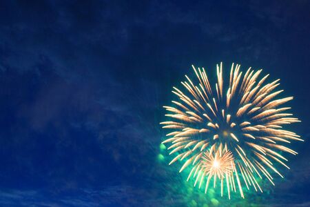 Fireworks display. 4th July fireworks. Fireworks display on dark sky background.の写真素材