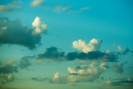 Large heavy clouds slowly float across the blue beautiful sky. Stunning landscape and view. Blue sky...