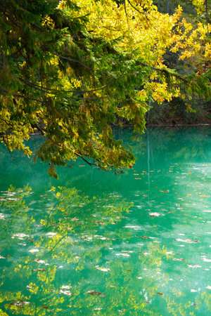 Blue mountain lake in autumn. Beautiful autumn morning