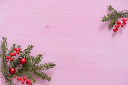 Christmas wooden background with red christmas tree toys and ballsの写真素材